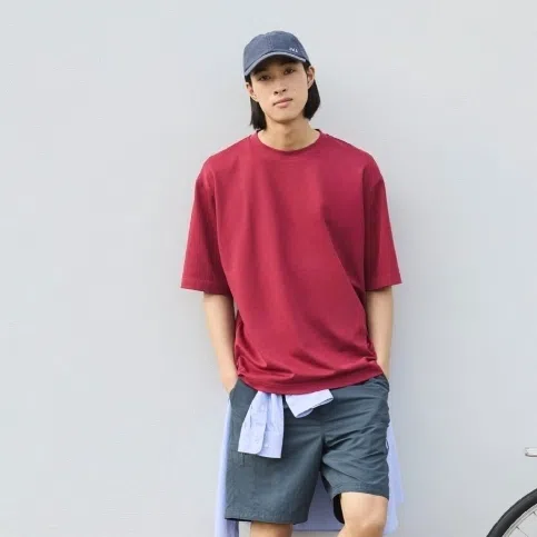 (Clockwise from top left) Uniqlo Airism Cotton Crew Neck Oversized T-shirt, Beyond The Vines Pocket Poofy Bag in Turquoise, ADLV Baby Face Short Sleeve T-shirt Donuts and four generations in batik.