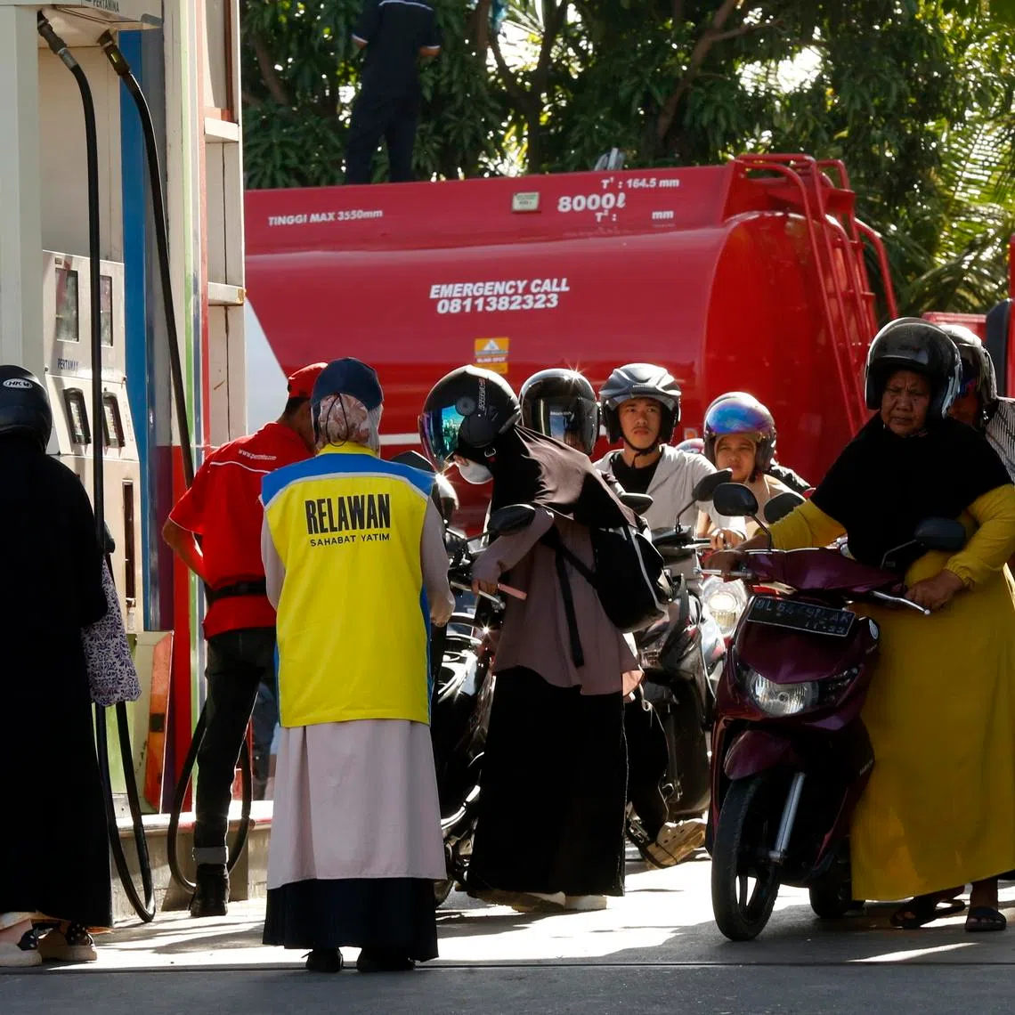 People queueing at a petrol station in Banda Aceh, Indonesia, on April 14. About a fifth of Indonesia’s crude imports come from the Middle East and pass through the Strait of Hormuz. 