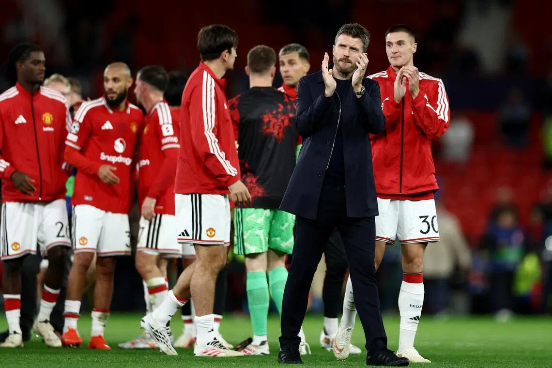 Manchester United manager Michael Carrick applauding fans after his team’s 4-0 Champions League thrashing of Azerbaijani minnows Sabah at Old Trafford on Sept 10.
