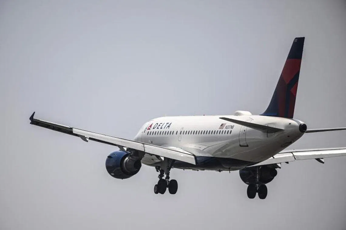 A plane of US airline Delta approaches for landing at Benito Juarez International Airport in Mexico City on July 22, 2025.