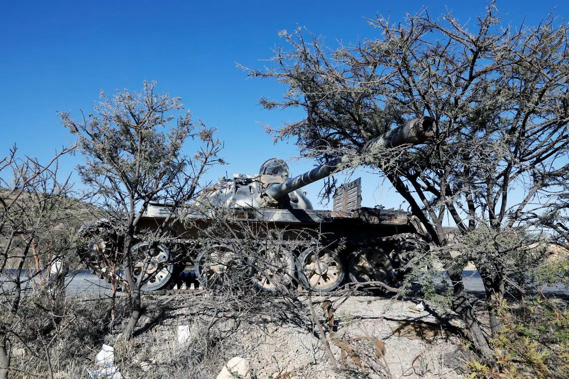 FILE PHOTO: A damaged Eritrean military tank is seen near the town of Wikro, Ethiopia, March 14, 2021.Picture taken March 14, 2021.REUTERS/Baz Ratner/File Photo