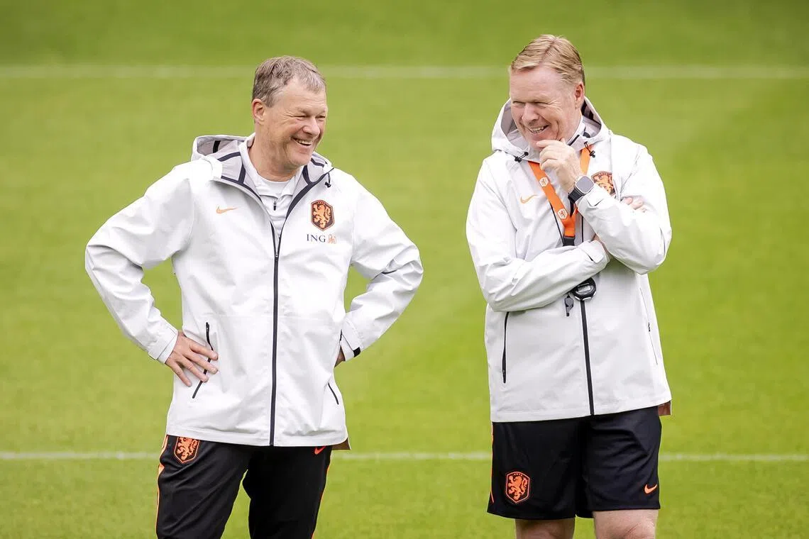 Netherlands coach Ronald Koeman (right) and his brother and assistant coach Erwin Koeman during a training session.