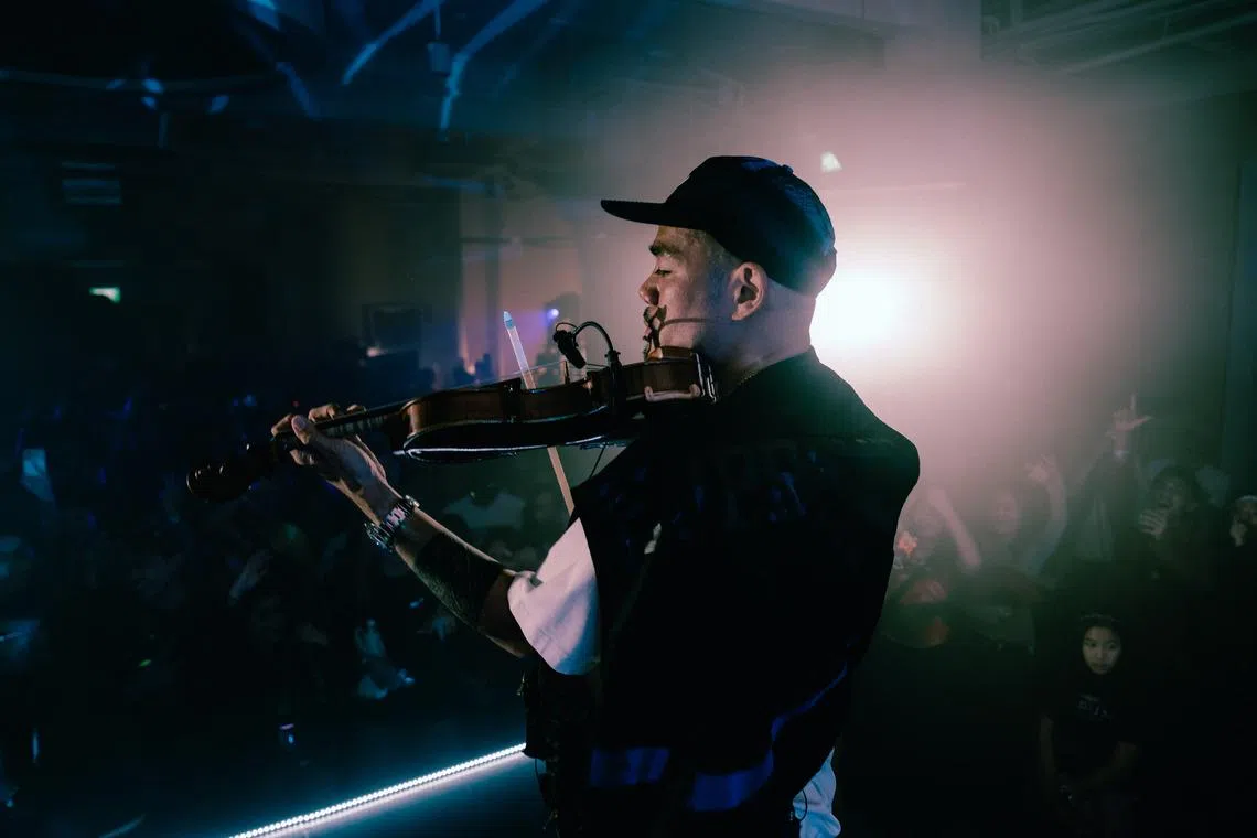 The line-up at Beatback included a violinist-DJ mashup set.