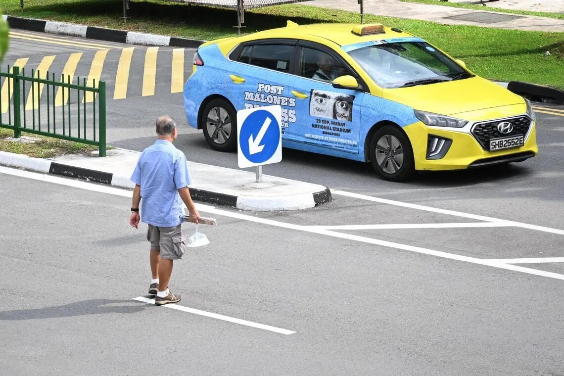 An elderly man jaywalking at Serangoon Avenue 3 on May 20, 2026. In 2025, 247 traffic accidents involved the elderly.