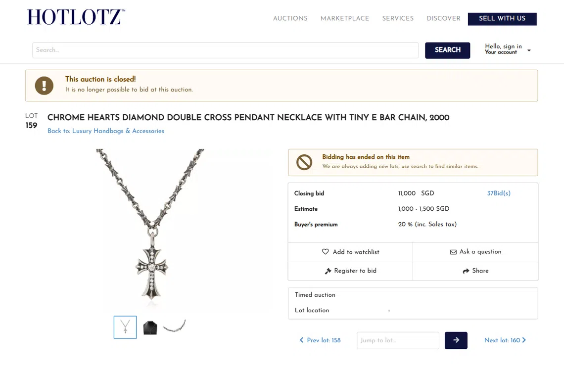 A Chrome Hearts diamond double cross pendant necklace, which was estimated at between $1,000 and $1,500, sold for $11,000 with 37 bids.