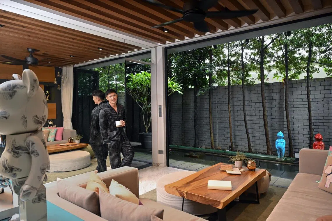 Actor Elvin Ng’s favourite spot in the house is a casual sitting area tucked beside a long koi pond and framed by greenery.