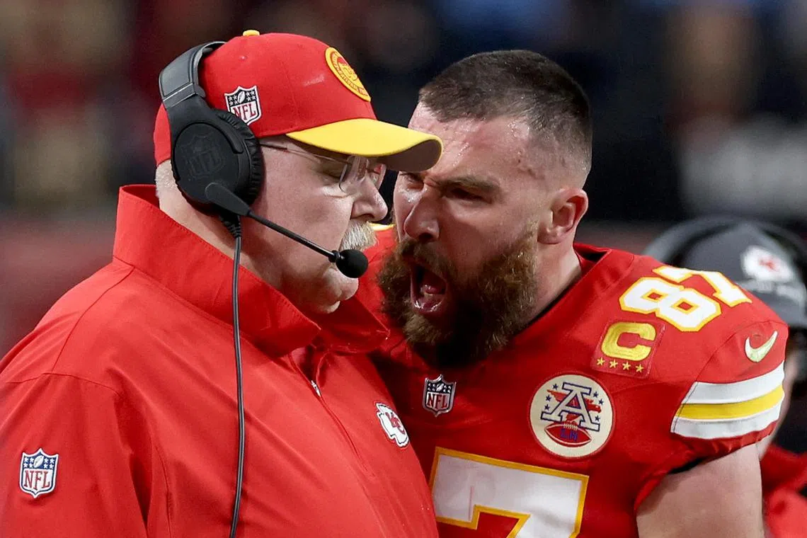 Travis Kelce of the Kansas City Chiefs exchanges words with head coach Andy Reid in the first half against the San Francisco 49ers during Super Bowl LVIII at Allegiant Stadium on Feb 11. The Chiefs went on to win 25-22.