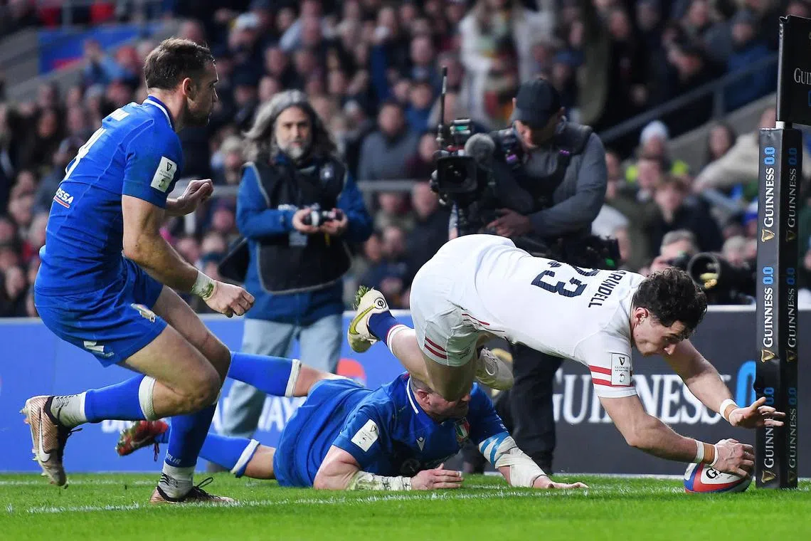 England's Henry Arundell scoring a try during the Six Nations Rugby Union match between England and Italy at Twickenham, which the hosts won 31-14.