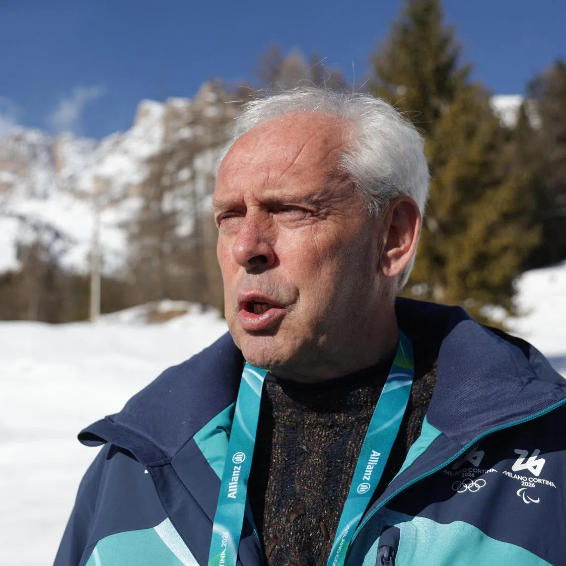Milano Cortina 2026 Winter Olympics - Interview with Thierry Robert-Luciani - Cortina D'Ampezzo, Italy - February 8, 2026 Thierry Robert-Luciani, a French meteorologist at the Milano Cortina Olympic Winter Games speaks during an interview as the Dolomites mountains are seen in the background REUTERS/Leonhard Foeger