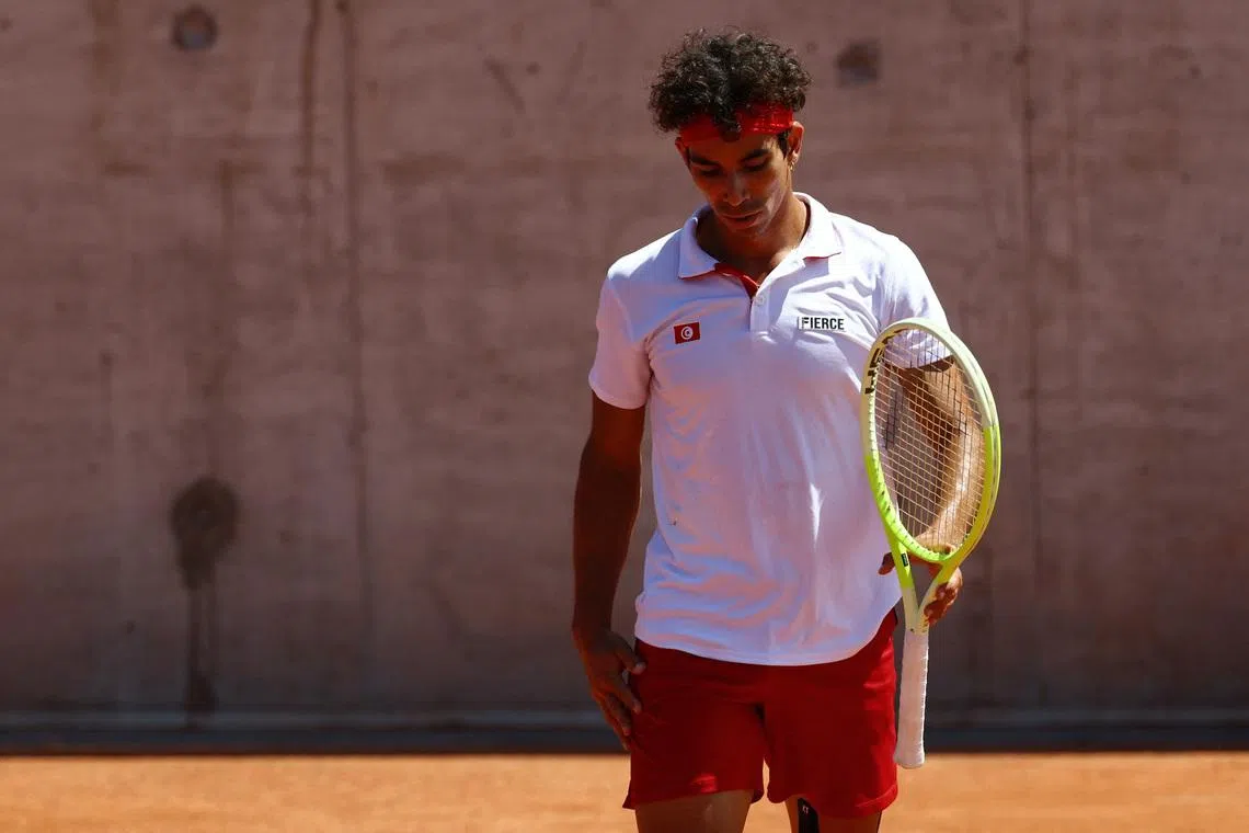 Paris 2024 Olympics - Tennis - Men's Singles First Round - Roland-Garros Stadium, Paris, France - July 28, 2024. Moez Echargui of Tunisia during his first round match against Daniel Evans of Britain. REUTERS/Edgar Su