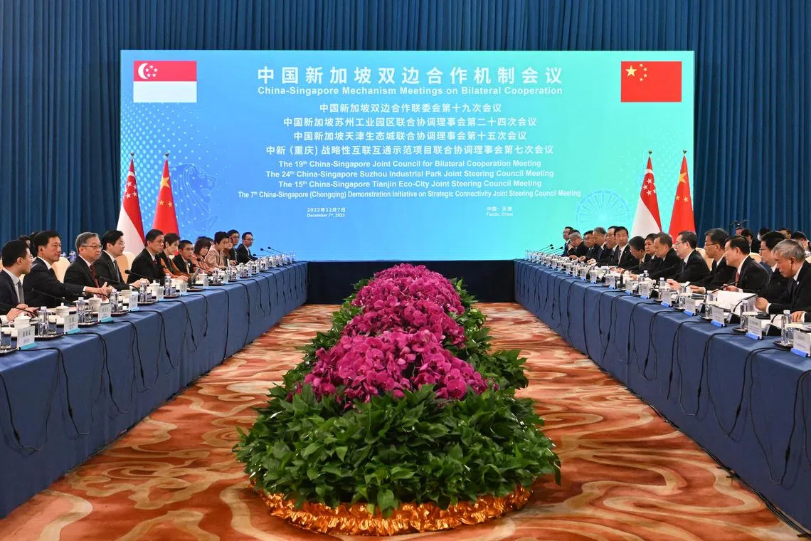 ST20231207-202323732532-Lim Yaohui-Elizabeth Law-eljcbc/

Opening remarks by Deputy Prime Minister Lawrence Wong and Chinese Vice Premier Ding Xuexiang during the 19th JCBC and related Joint Steering Council (JSC) meetings at Tianjin Eco-City Hilton Hotel at Tianjin Eco-City Hilton Hotel in Tianjin, China on Dec 7, 2023. 

Singapore and Chinese leaders held their first in-person meeting of their apex collaboration forum, the Joint Council for Bilateral Cooperation (JCBC) in Tianjin on Dec 7, the first under new leaders Deputy Prime Minister Lawrence Wong and Chinese Executive Vice-Premier Ding Xuexiang. Some 20 deliverables were announced following the meetings, including a new 30-day visa exemption currently in the works.

(ST PHOTO: LIM YAOHUI)