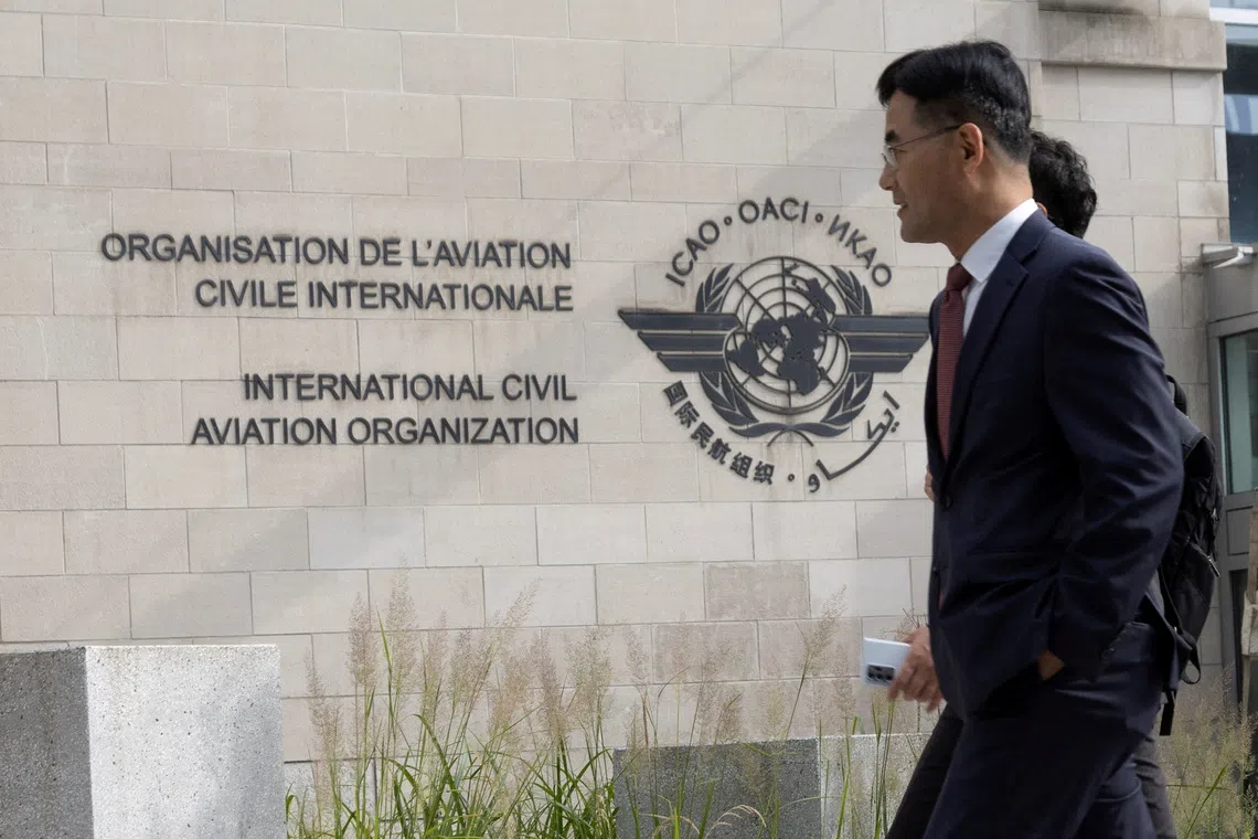 FILE PHOTO: Members of the International Civil Aviation Organization (ICAO) agency arrive at ICAO headquarters in Montreal, Quebec, Canada October 1, 2022.  REUTERS/Christinne Muschi/File Photo