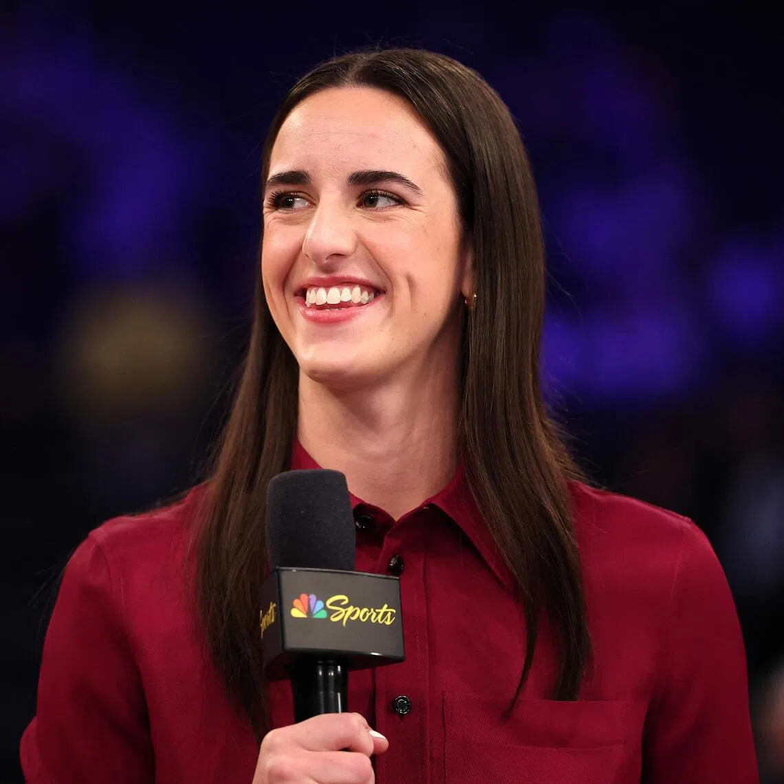 Caitlin Clark, one of the WNBA's stars, talking on stage before an NBA game between the Los Angeles Lakers and New York Knicks at Madison Square Garden on Feb 1.