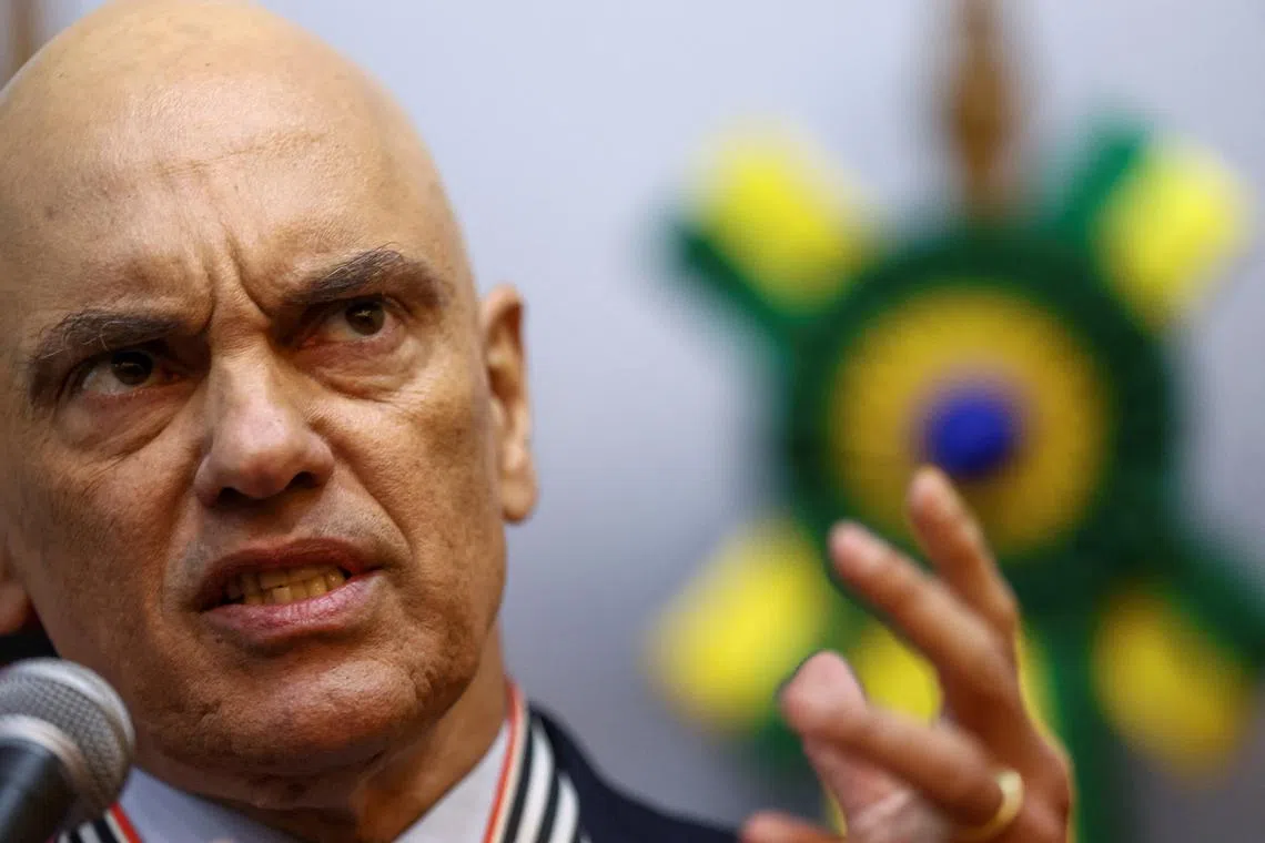 FILE PHOTO: Brazil's Supreme Court Judge Alexandre de Moraes attends an event where he received a tribute by the Public Ministry of Sao Paulo, after the Brazilian Supreme Court ordered an immediate suspension of social media platform X in the country, in Sao Paulo, Brazil August 30, 2024. REUTERS/Carla Carniel/File Photo