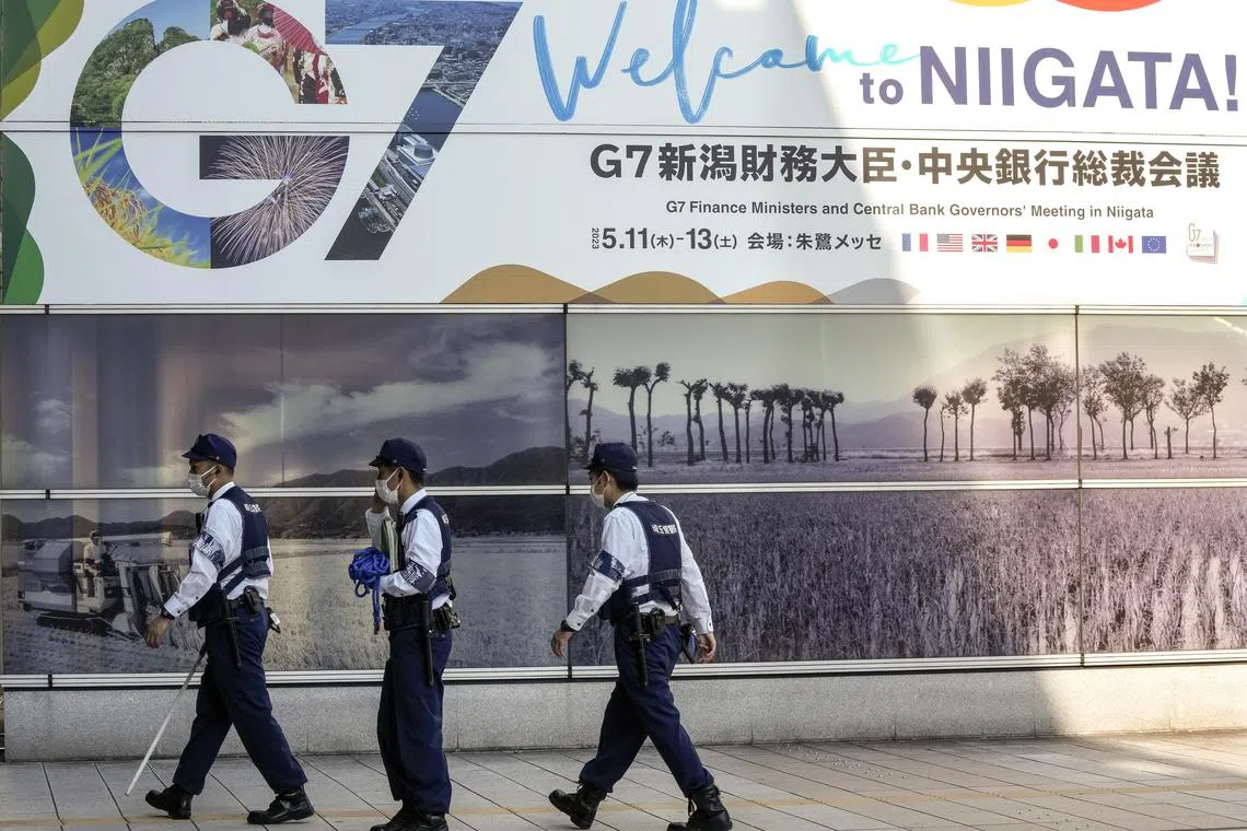 Japanese policemen patrol Niigata Station in preparation for the G-7 Finance Ministers and Central Bank Governors meeting in Niigata.
