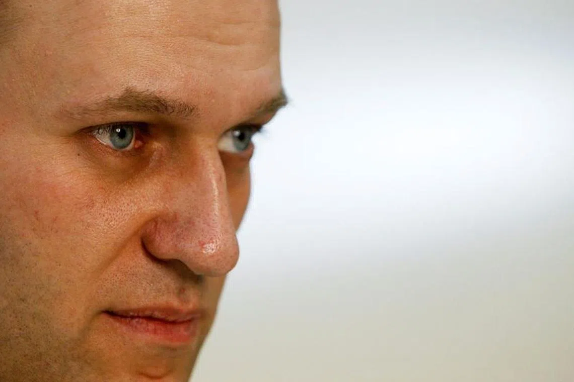 Russian opposition leader and anti-graft blogger Alexei Navalny gives an interview to Reuters at his office in Moscow, April 15, 2013. REUTERS/Sergei Karpukhin