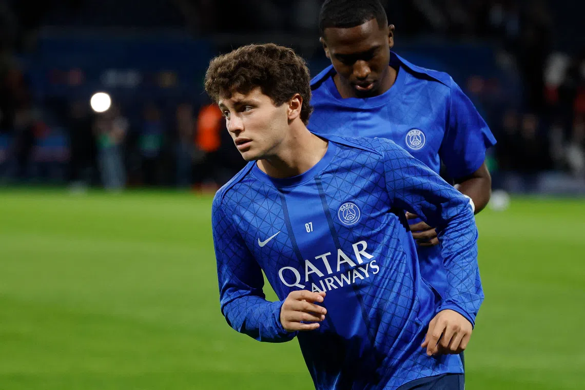 Soccer Football - UEFA Champions League - Paris St Germain v Atalanta - Parc des Princes, Paris, France - September 17, 2025 Paris St Germain's Joao Neves during the warm up before the match REUTERS/Stephanie Lecocq