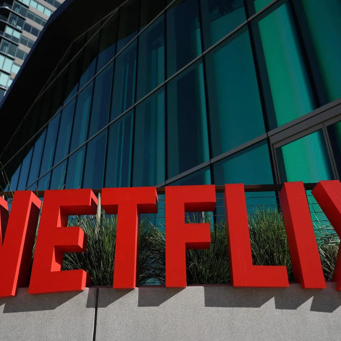 Netflix's Q4 revenue modestly beat estimates at US$12.1 billion, with over 325 million subscribers, but shares fell after-hours.