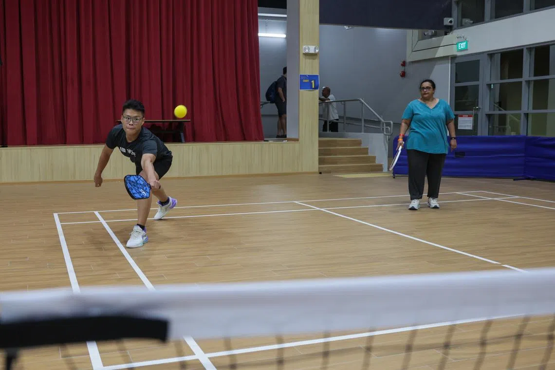 Mr Isaac Teo (left) and Ms Aarti Naidu participating at the “Silent Pickleball” Try-Out held in Mountbatten CC on Jan 11.