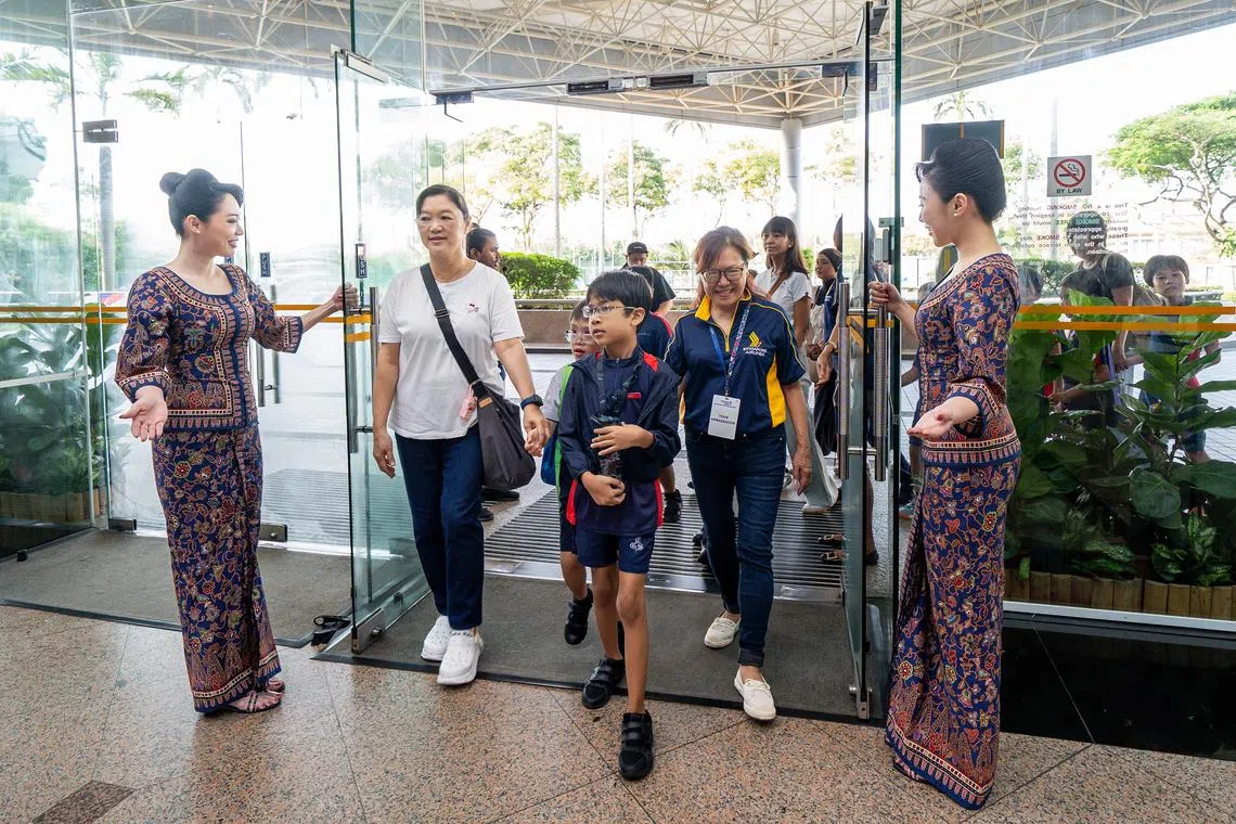 Over 400 beneficiaries and caregivers attended the SIA Cares Open House held at the SIA Training Centre in Upper Changi on July 19. 