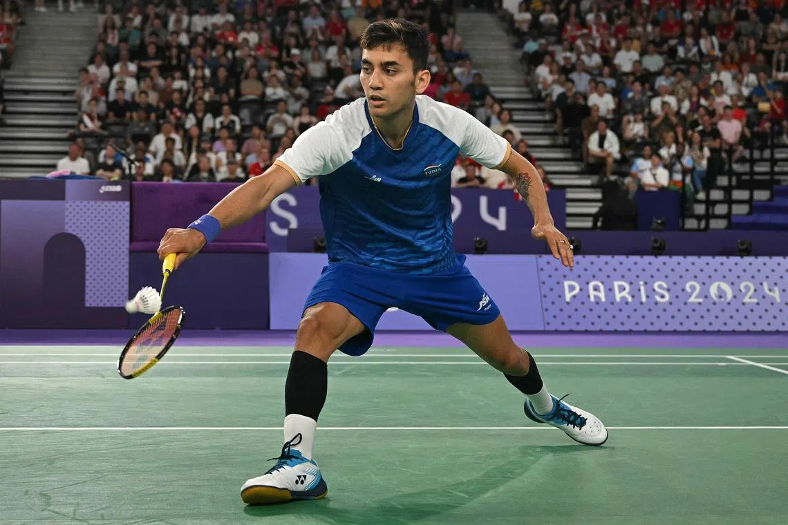 India's Lakshya Sen playing a shot to Malaysian Lee Zii Jia in their men's singles badminton bronze-medal match during the Paris 2024 Olympic Games on Aug 5.