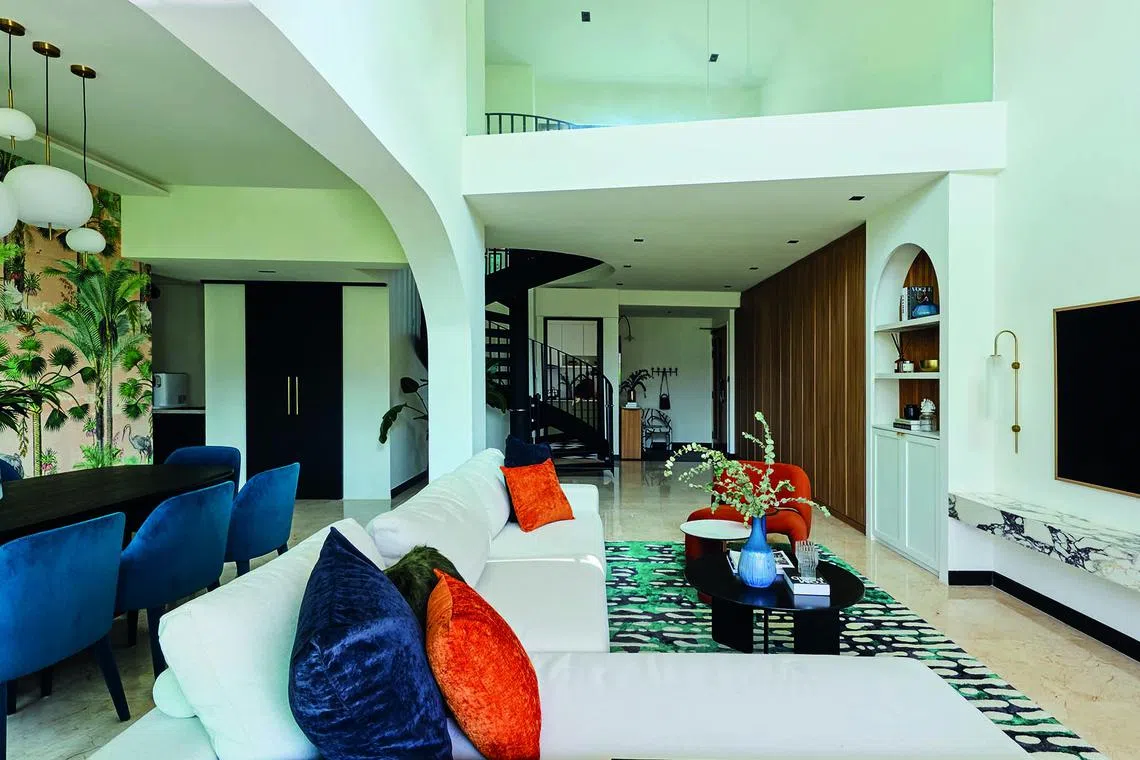 The living area is a spacious double-volume space. Three bedrooms are on the first floor, and one is on the second.