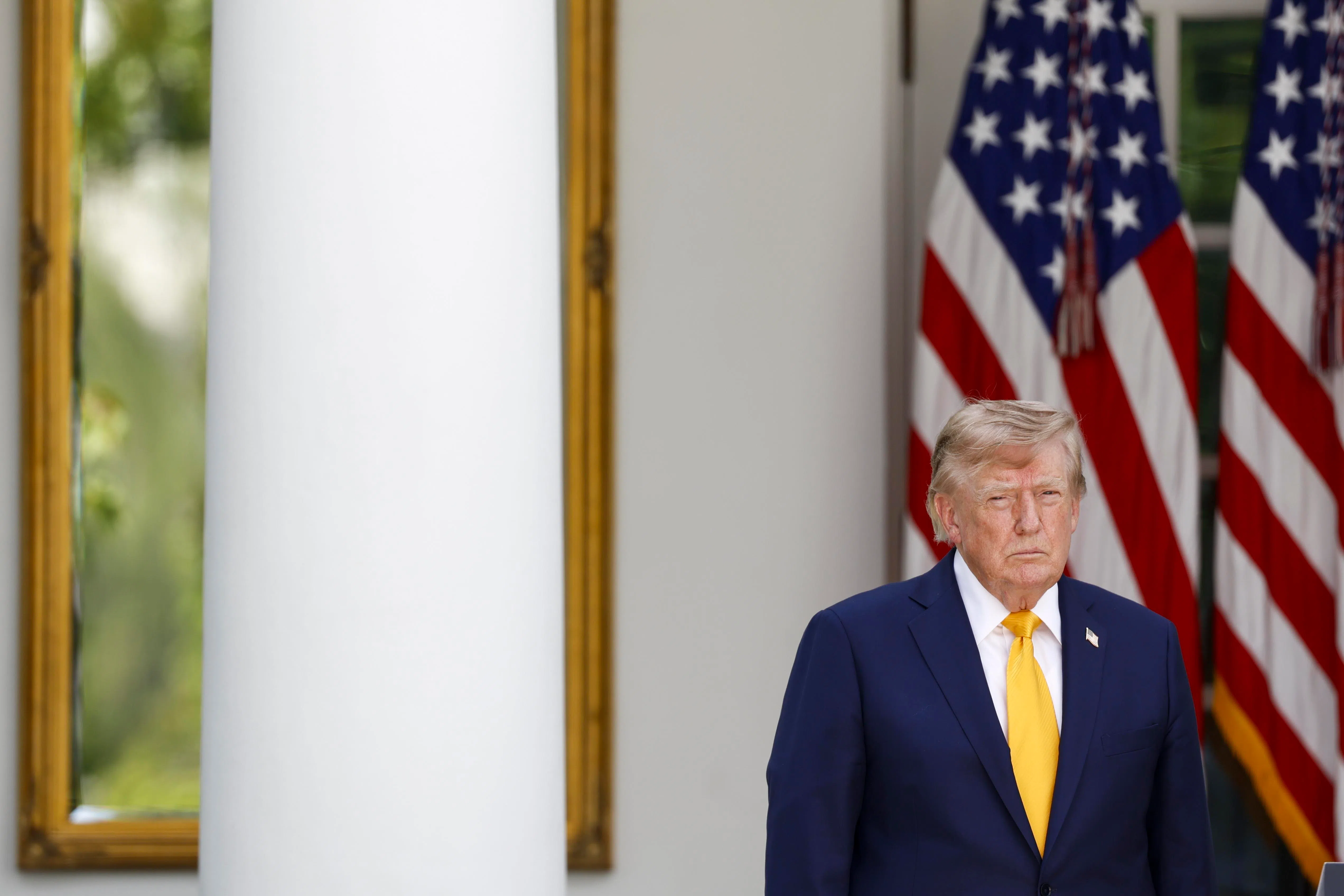 epa13189297 US President Donald Trump listens as Secretary of Education Linda McMahon delivers remarks during an education event in the Rose Garden of the White House in Washington, DC, USA, 24 August 2026. President Trump and Secretary McMahon highlighted the administration’s school choice program as the new academic year begins.  EPA/WILL OLIVER / POOL