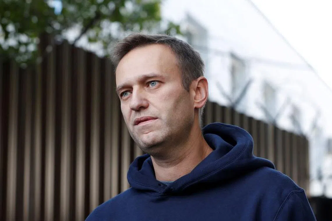 FILE PHOTO: Russian opposition leader Alexei Navalny speaks with journalists after he was released from a detention centre in Moscow, Russia August 23, 2019. REUTERS/Evgenia Novozhenina/File Photo