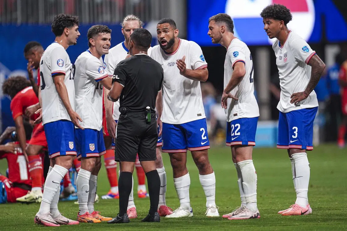 FILE PHOTO: Jun 27, 2024; Atlanta, GA, USA; United States  players dispute a call during the match against Panama during the second half at Mercedes-Benz Stadium. Mandatory Credit: Dale Zanine-USA TODAY Sports/File Photo