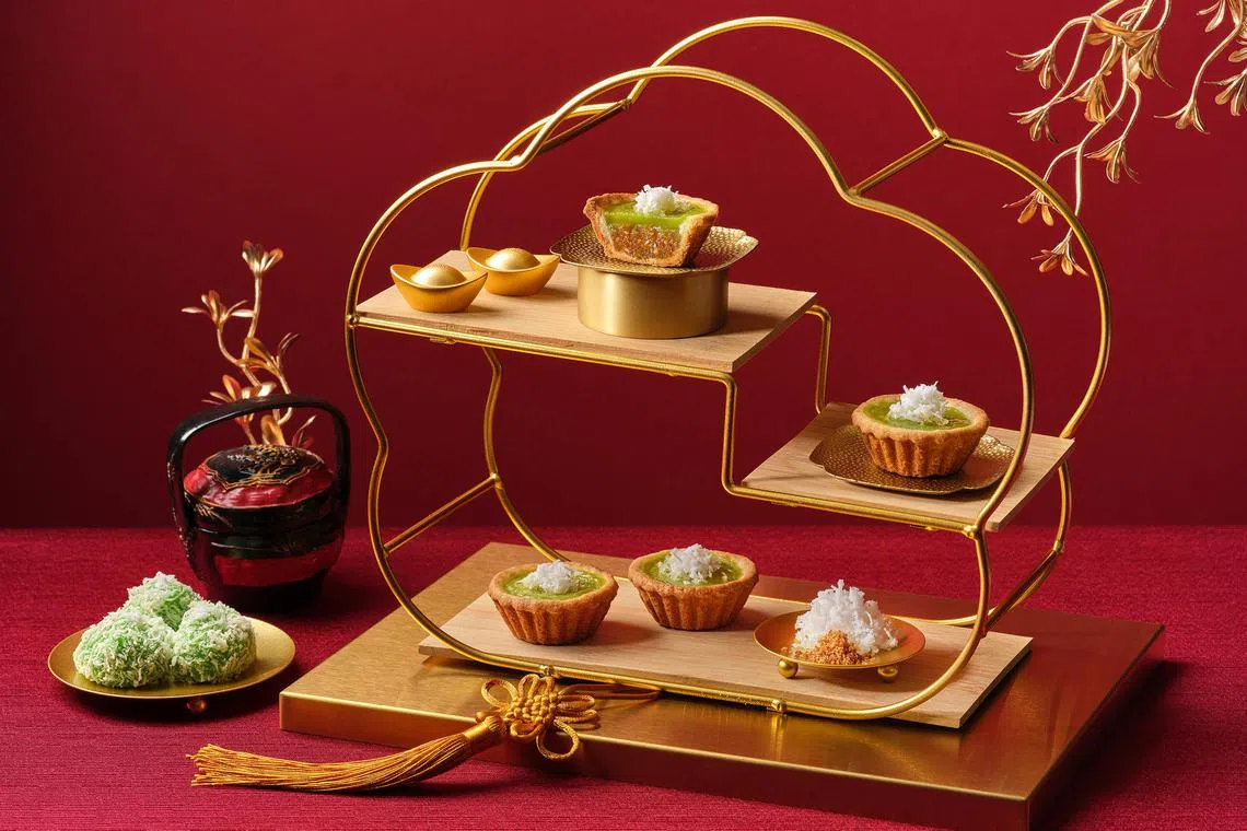 eqsnack27 - 5 Singapore Marriott Tang Plaza Hotel - Golden Nian Gao Tarts with Gula Melaka and Grated Coconut

Source and copyright: Singapore Marriott Tang Plaza Hotel