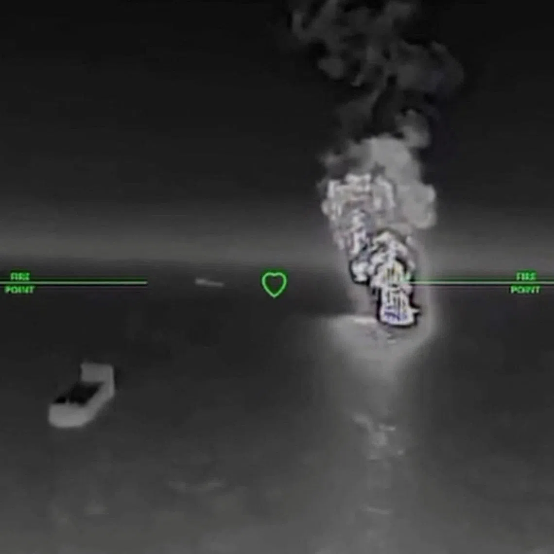 Smoke rises after what the Ukranian authorities say was during a strike as Ukrainian UAVs hit a Russian dark fleet tanker at a location given as Sea of Azov in this screengrab taken from a handout video released on July 7, 2026. Commander of Unmanned Aerial Systems Force/Handout via REUTERS