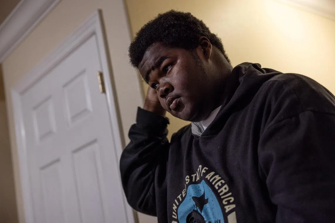 Billy Small III, who is under treatment with Novo Nordisk's weight-loss drug Wegovy, looks on at his home in Oakland, California, U.S., February 5, 2024. REUTERS/Carlos Barria   ONLY FOR USE WITH STORY HEALTH-OBESITY/ADOLESCENTS
