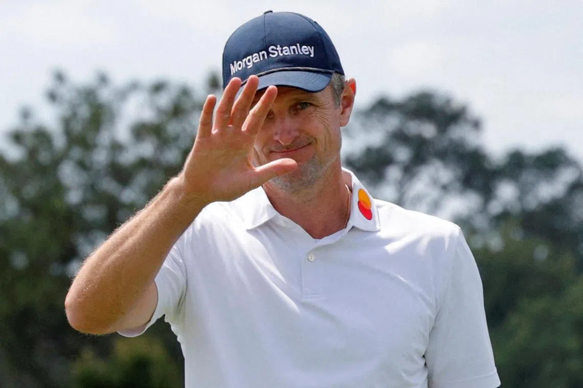 Golf - The Masters - Augusta National Golf Club, Augusta, Georgia, U.S. - April 11, 2025 England's Justin Rose acknowledges the crowd on the green on the 18th hole after completing his second round. REUTERS/Brian Snyder