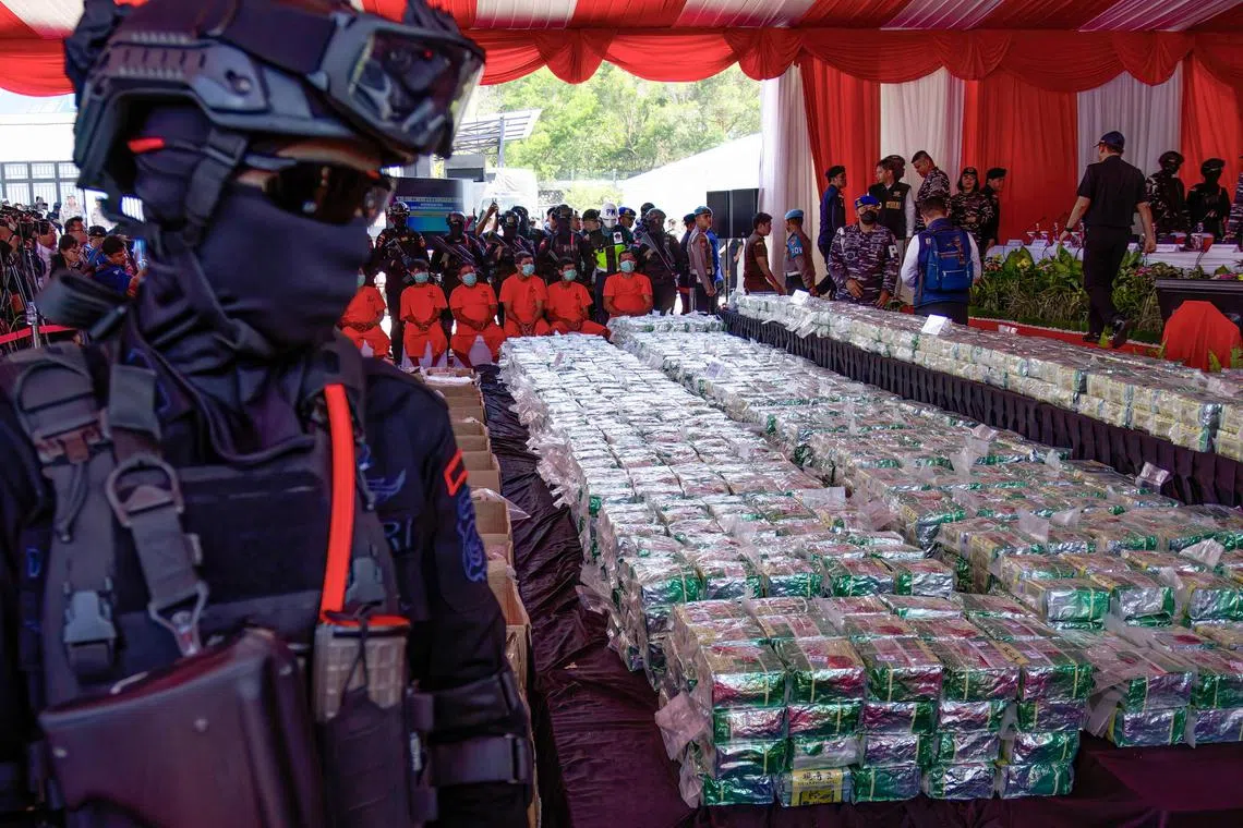 Officials from Indonesia’s National Narcotics Agency holding a press conference in Batam on May 26 after the agency seized a record 2.1 tonnes of methamphetamine.