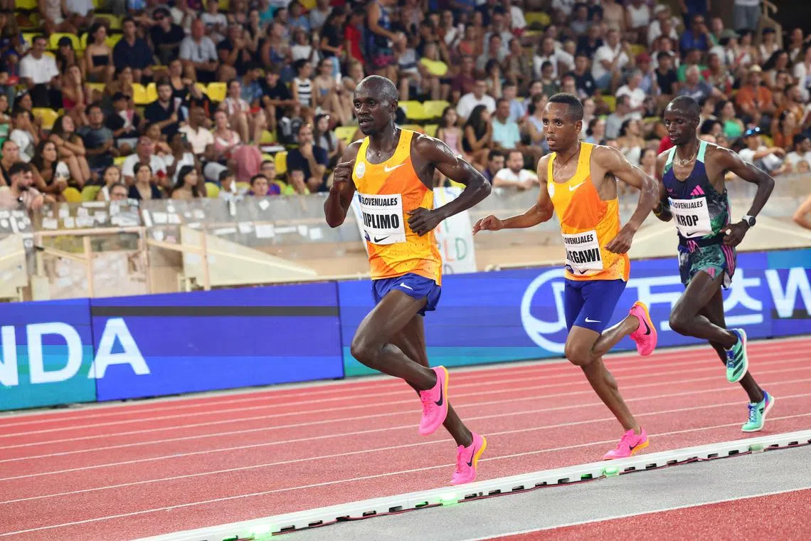 From letf: Jacob Kiplimo of Uganda, Berihu Aregawi of Ethiopia and Jacob Krop of Kenya compete in the Men's 5000m event during the IAAF Diamond League "Herculis" athletics meeting at the Louis II Stadium in Monaco, on July 21. Kiplimo is one of the stars of Uganda's rise in distance running.
