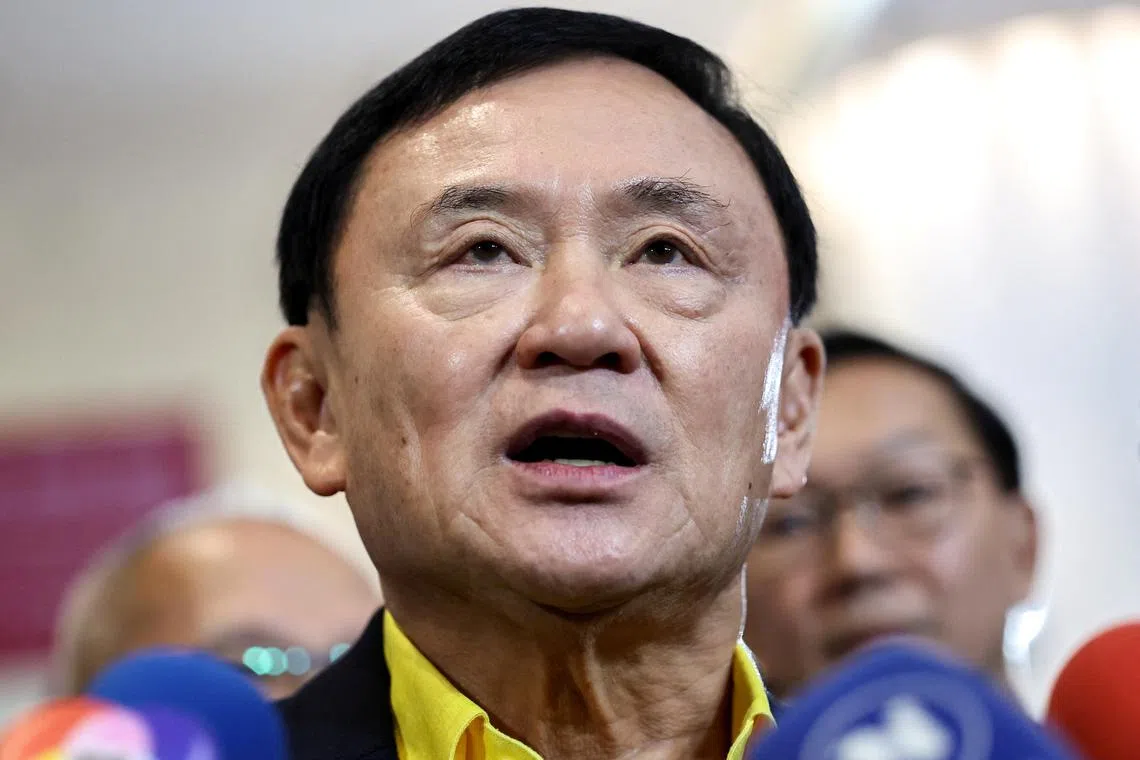 FILE PHOTO: Thailand's former Prime Minister Thaksin Shinawatra speaks to members of the media as he attends THACCA SPLASH - Soft Power Forum 2024 at the Queen Sirikit National Convention Center in Bangkok, Thailand, June 28, 2024. REUTERS/Athit Perawongmetha/File photo