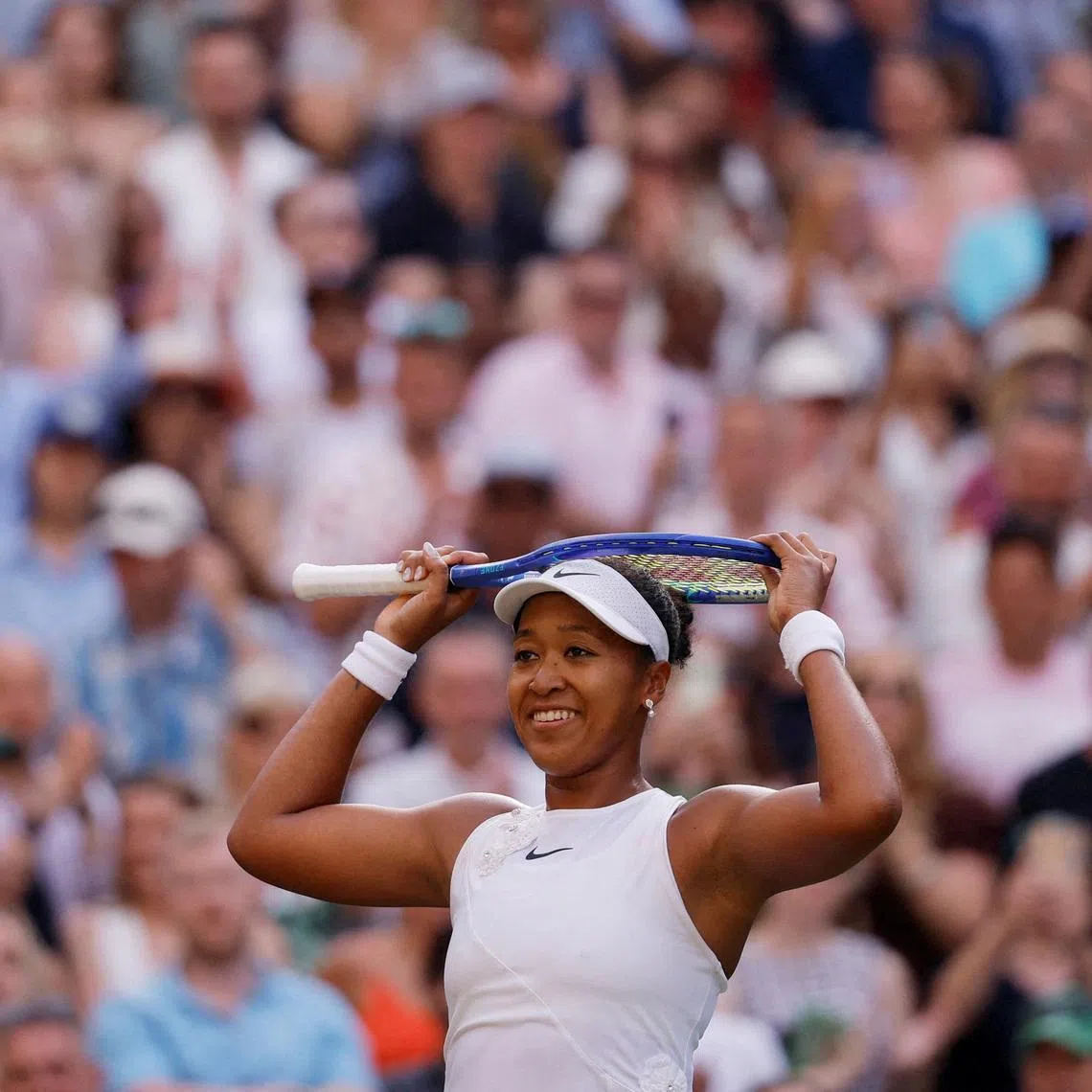 Tennis - Wimbledon - All England Lawn Tennis and Croquet Club, London, Britain - July 5, 2026 Japan's Naomi Osaka celebrates after winning her fourth round match against Belarus' Aryna Sabalenka REUTERS/Andrew Couldridge