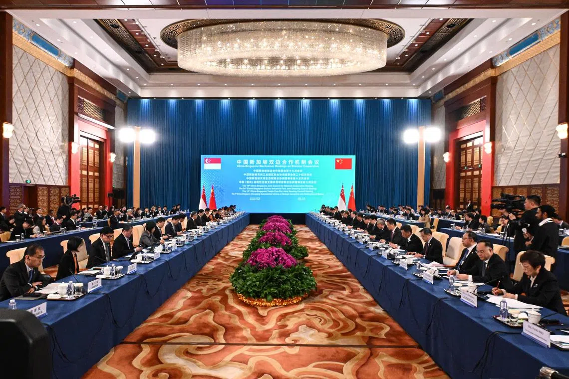 ST20231207-202323732532-Lim Yaohui-Elizabeth Law-eljcbc/
Opening remarks by Deputy Prime Minister Lawrence Wong and Chinese Vice Premier Ding Xuexiang during the 19th JCBC and related Joint Steering Council (JSC) meetings at Tianjin Eco-City Hilton Hotel in Tianjin, China on Dec 7, 2023.
Singapore and Chinese leaders held their first in-person meeting of their apex collaboration forum, the Joint Council for Bilateral Cooperation (JCBC) in Tianjin on Dec 7, the first under new leaders Deputy Prime Minister Lawrence Wong and Chinese Executive Vice-Premier Ding Xuexiang. Some 20 deliverables were announced following the meetings, including a new 30-day visa exemption currently in the works.
(ST PHOTO: LIM YAOHUI)