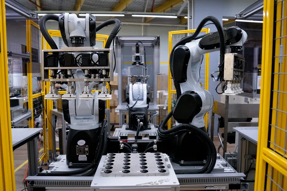 An AI-powered vision system, co-developed by Sunningdale Tech and A*Star, inspects components on the factory floor.
