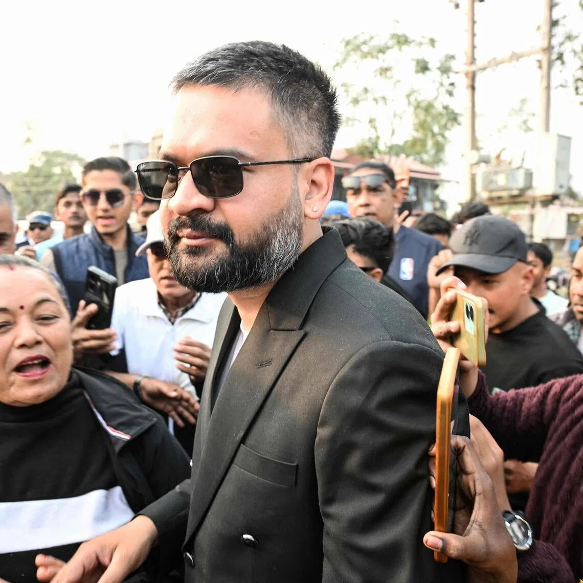 Mr Balendra Shah's (C) nationwide appeal is driven by the work he has done as the mayor of Kathmandu.