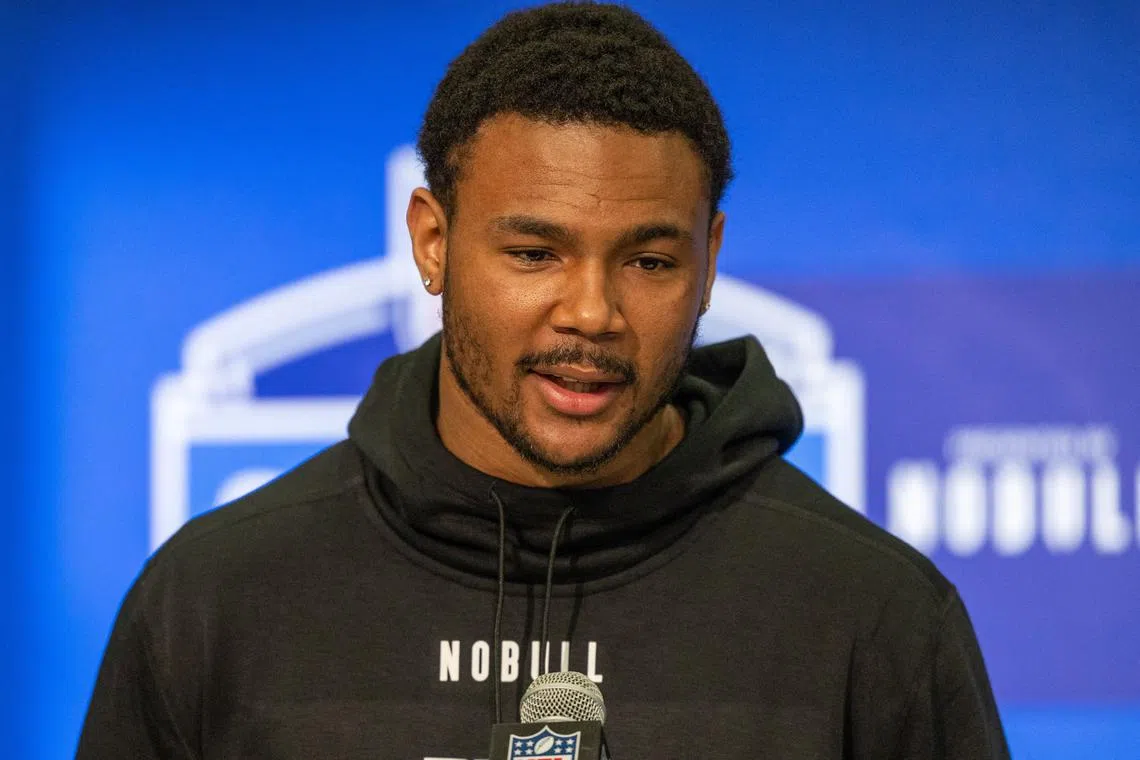 FILE PHOTO: Feb 29, 2024; Indianapolis, IN, USA; Texas tight end Ja'Tavion Sanders (TE11) talks to the media during the 2024 NFL Combine at Lucas Oil Stadium. Trevor Ruszkowski-USA TODAY Sports/File Photo