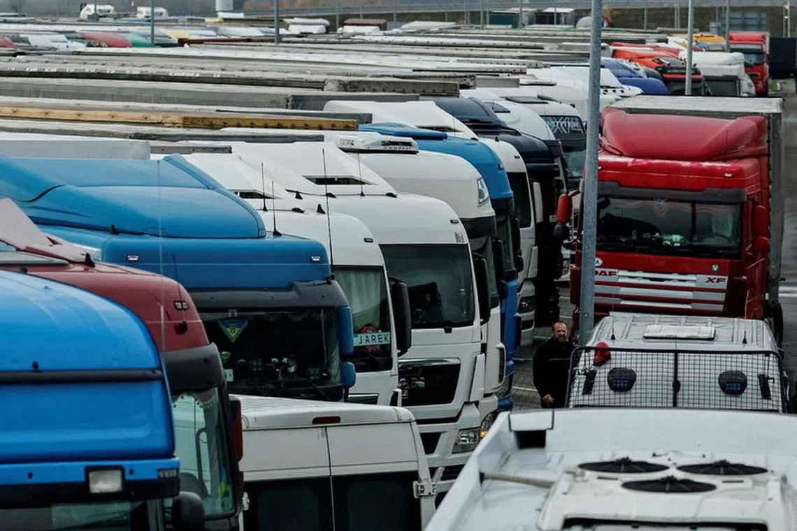 FILE PHOTO: Ukrainian trucks are seen near the Poland-Ukraine border, near the village of Korczowa, Poland November 19, 2023. REUTERS/Yan Dobronosov/File Photo
