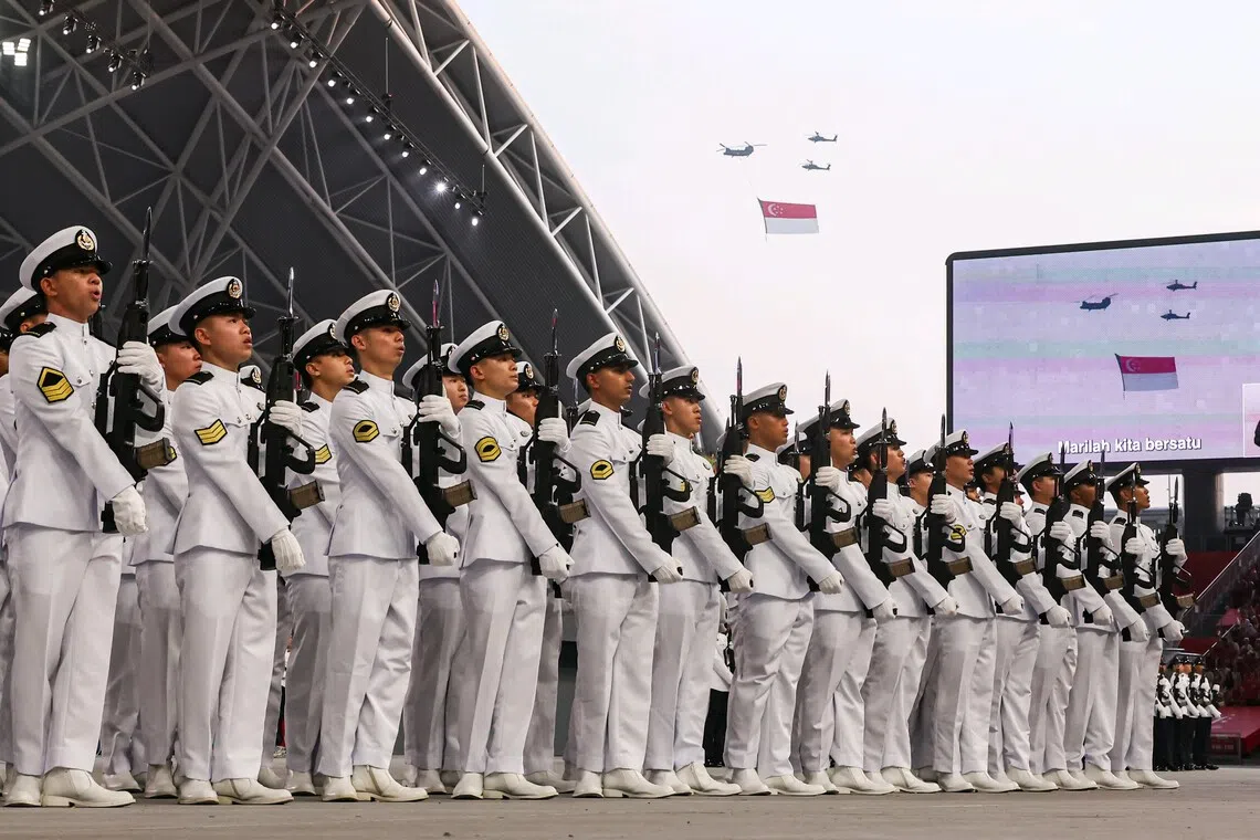 The National Anthem is sung during the state flag flypast in National Day Parade 2026 at the National Stadium on Aug 9, 2026. ST PHOTO: BRIAN TEO