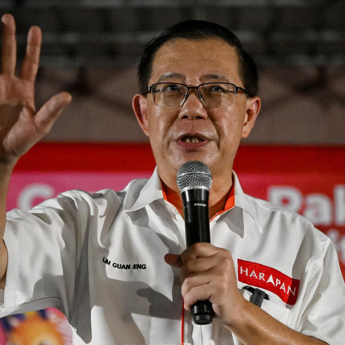 DAP chairman Lim Guan Eng speaks to supporters at the Pakatan Harapan rally in Kampar, Perak on 16 Nov 2022.
DAP chairman Lim Guan Eng is among the invited speakers in what is expected to be one of their stronghold bases, despite the party's candidate contesting the Kampar parliament seat for the first time.