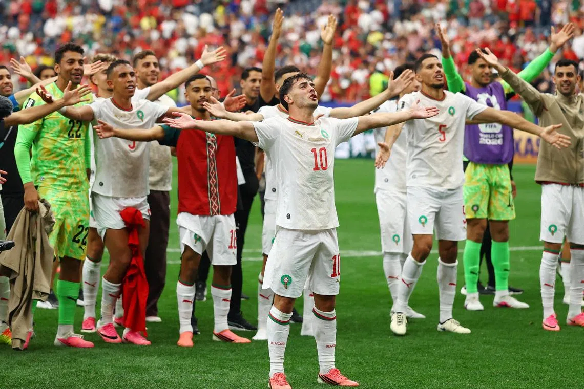 Soccer Football - FIFA World Cup 2026 - Round of 16 - Canada v Morocco - Houston Stadium, Houston, Texas, U.S. - July 4, 2026 Morocco's Brahim Diaz and teammates celebrate after the match REUTERS/Hannah Mckay