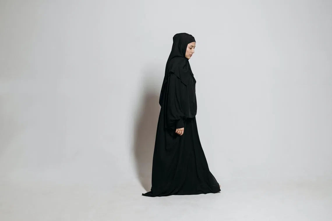 The abaya is a loose-fitting, full-length robe worn by some Muslim women.
