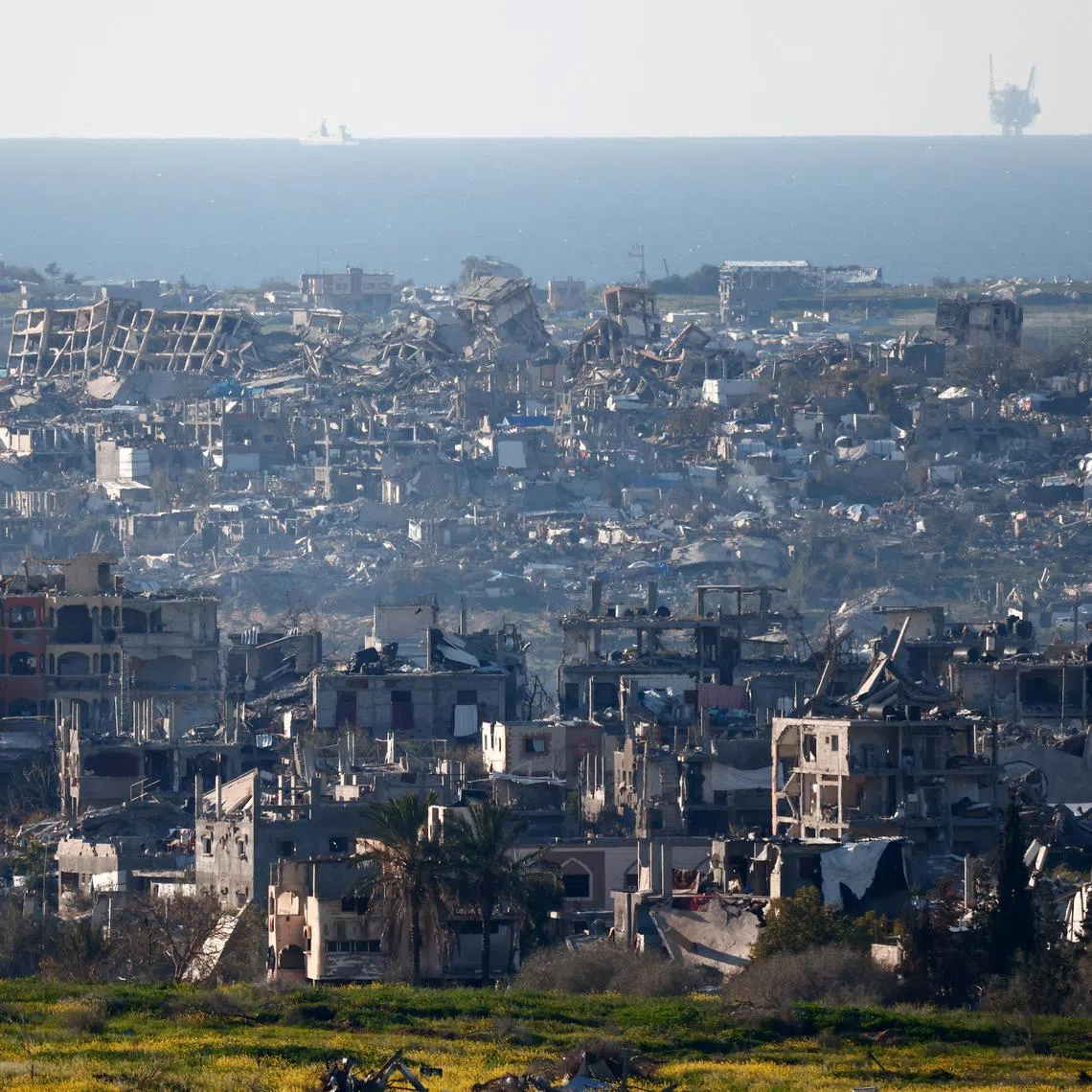 Damaged buildings in north Gaza. Some Singaporeans have called for Singapore to go beyond providing humanitarian assistance to Gaza.