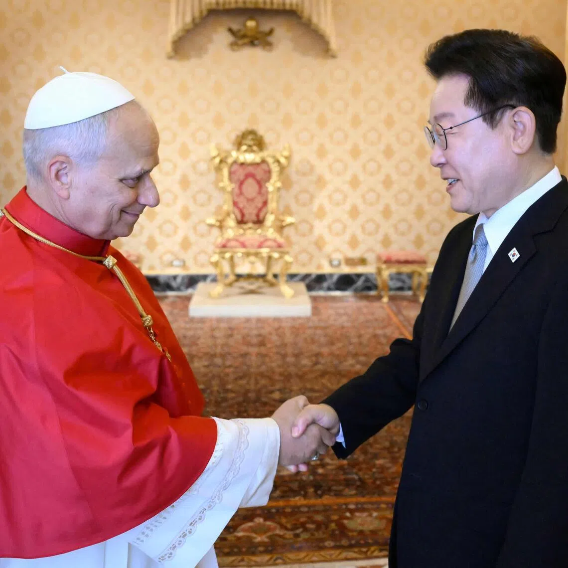 Pope Leo (left) shaking hands with South Korea's President Lee Jae Myung ahead of their meeting at The Vatican.  