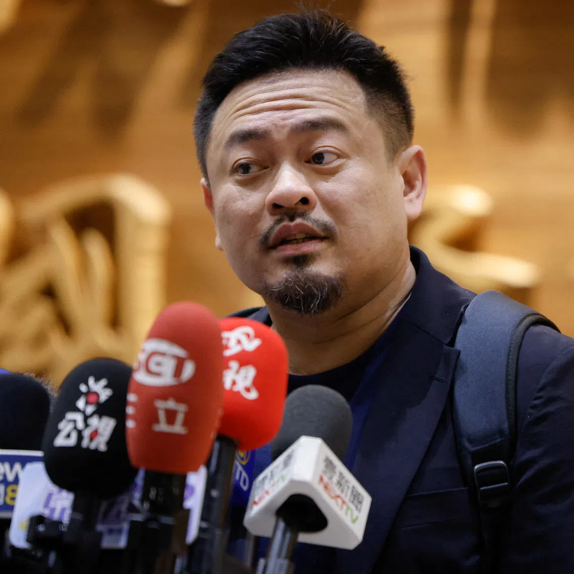Taiwan Labour Minister Hung Sun-han speaks to the media after returning from attending the Asia-Pacific Economic Cooperation (APEC) meeting in Shanghai, China, at Taiwan Taoyuan International Airport in Taoyuan, Taiwan, September 22, 2026. REUTERS/Ann Wang