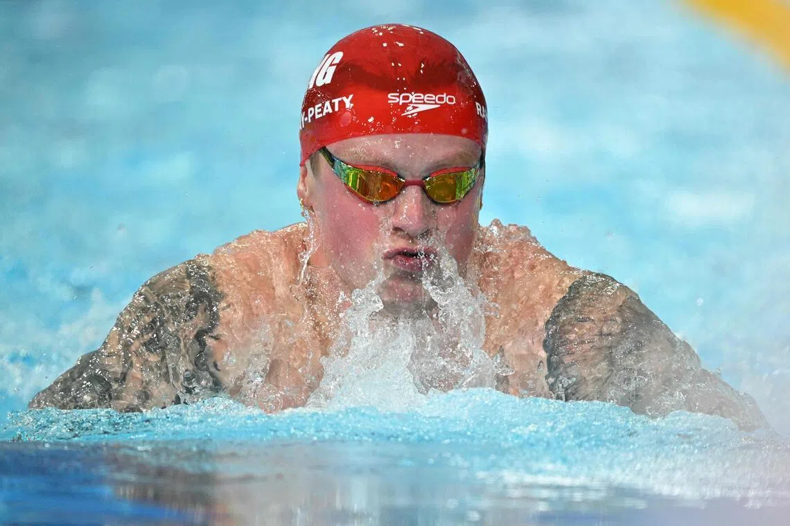 Englands's Adam Ramsay-Peaty competes in the Men's 100m Breaststroke Final during the swimming event at the Tollcross International Swimming Centre in Glasgow, on day two of the Commonwealth Games in Glasgow, Scotland, on July 25, 2026. (Photo by Oli SCARFF / AFP)